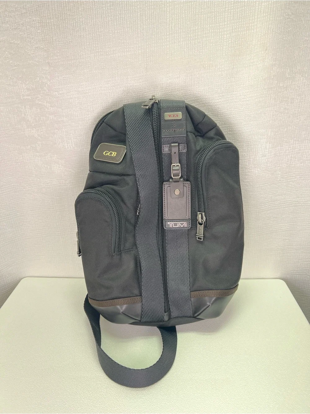 TUMI Alpha Bravo Monterey Men's Sling Bag Black Nylon with Brown Leather Accents